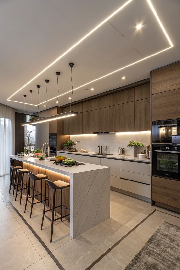 Layered kitchen lighting with recessed lights, pendants, and under-cabinet LEDs